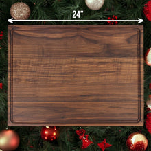 Load image into Gallery viewer, Introducing our exquisite Christmas Walnut Serving Board. Crafted with meticulous attention to detail, this serving board is designed to enhance the presentation of your favorite holiday treats and delicacies.