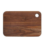 Walnut thumb-hole cutting board plain reverse face, top view.