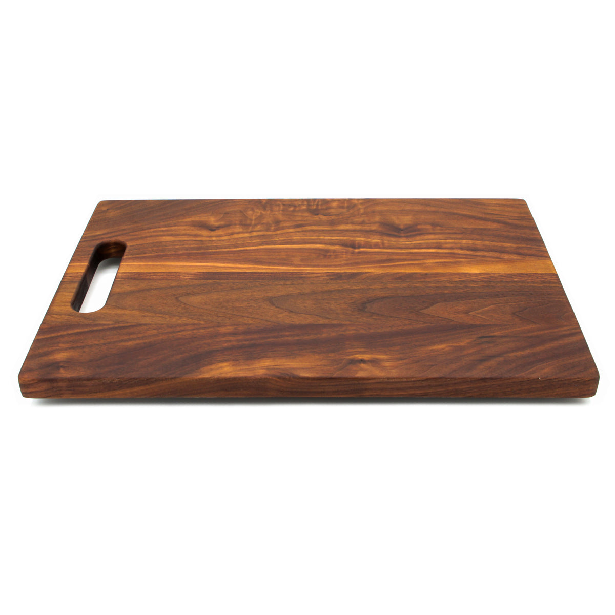 Walnut 16 × 10.5 single-handle cutting board, low angle