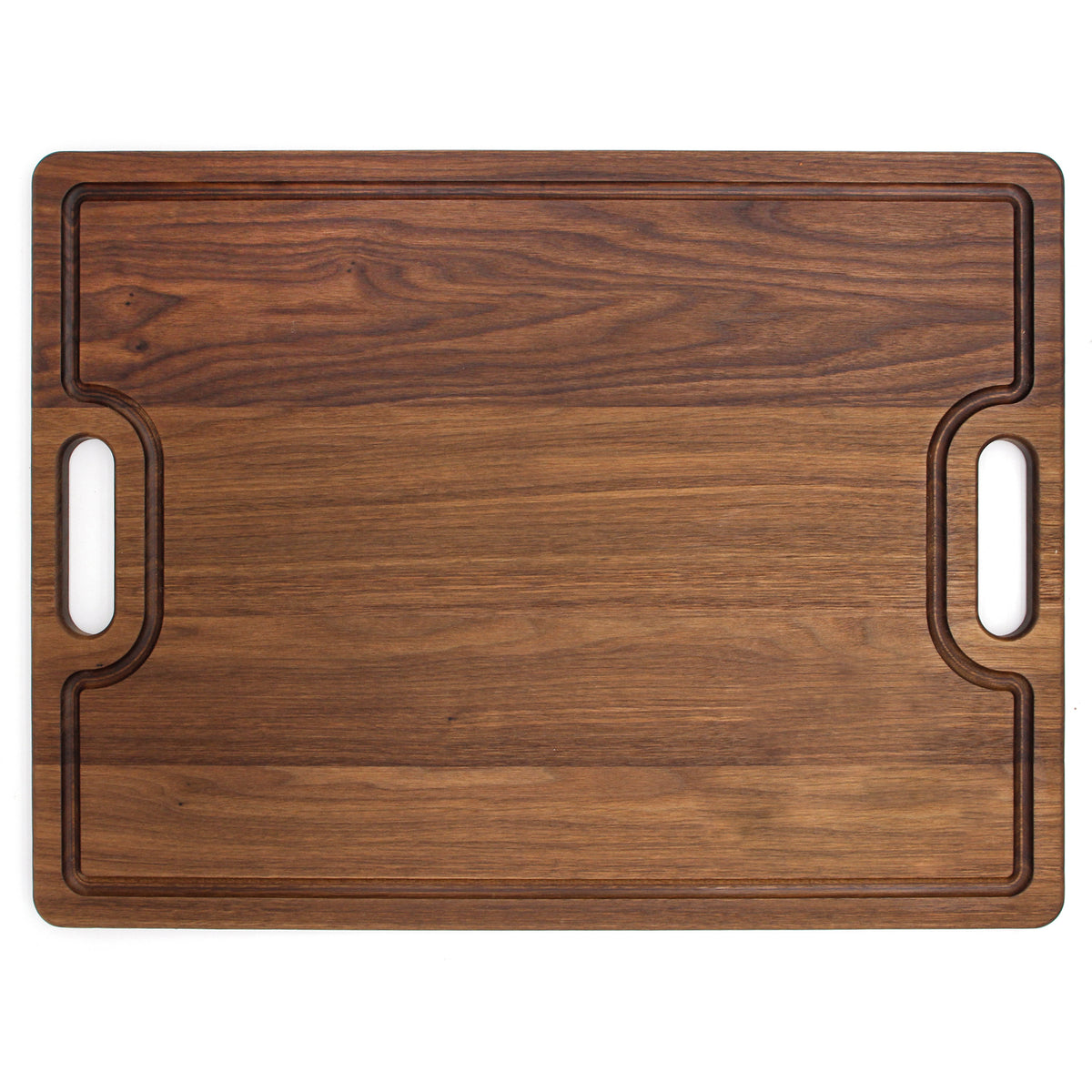 Walnut 24 × 18 extra-large cutting board with cutout handles and groove