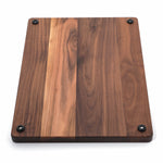 Walnut 24 × 18 thick flat-grain cutting board with Rubber Feet, underside view