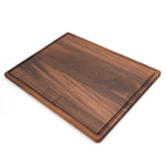 Walnut 24 × 18 extra-large cutting board, angled groove view