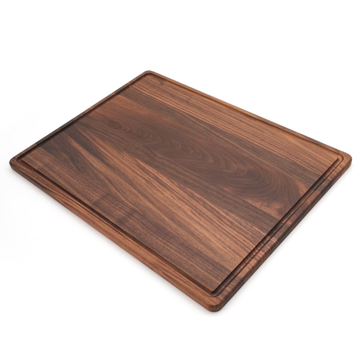 Walnut 24 × 18 extra-large cutting board, angled groove view