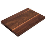 Walnut 18 × 12 thick flat-grain cutting board, angled view with side handles