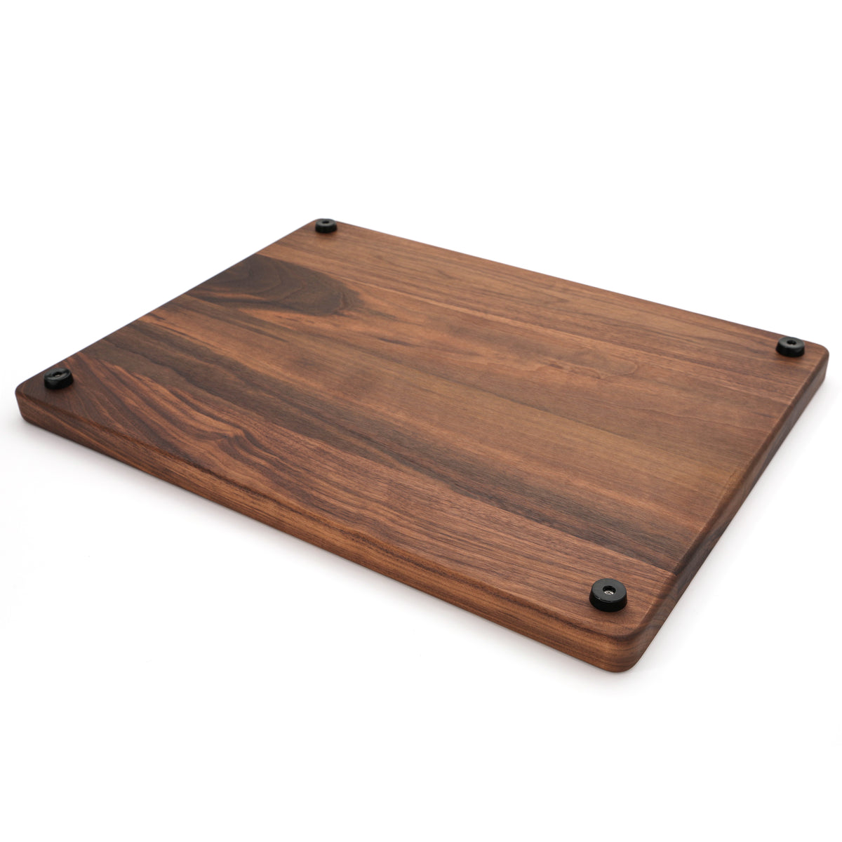 Walnut 24 × 18 thick flat-grain cutting board with feet, underside angle