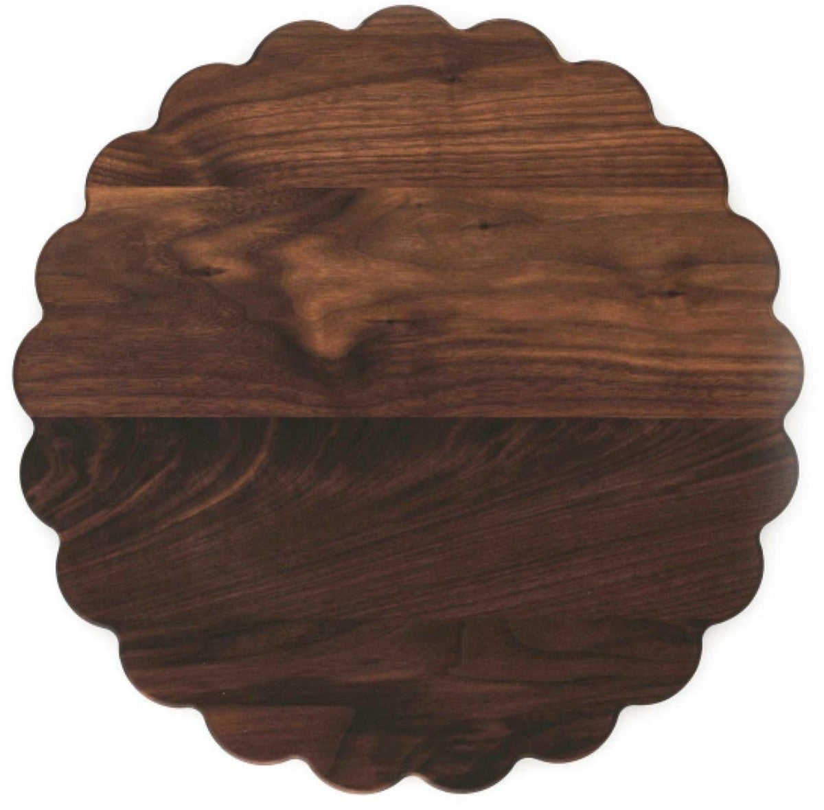 Round walnut serving board with a scalloped edge