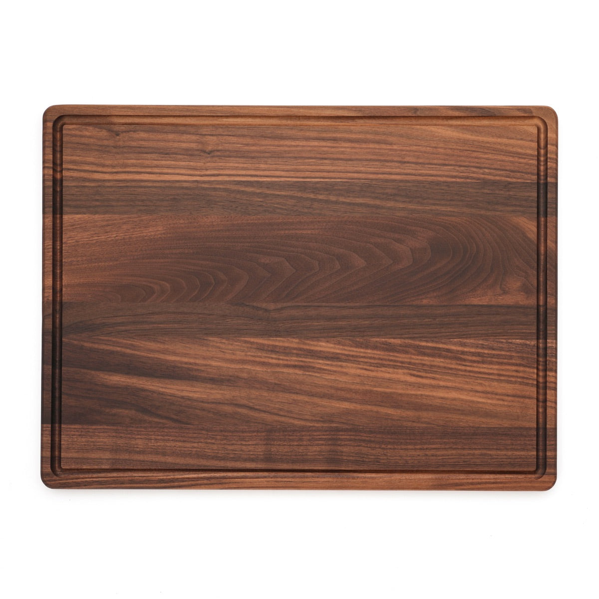 Overhead photograph of a Walnut cutting board with a juice groove